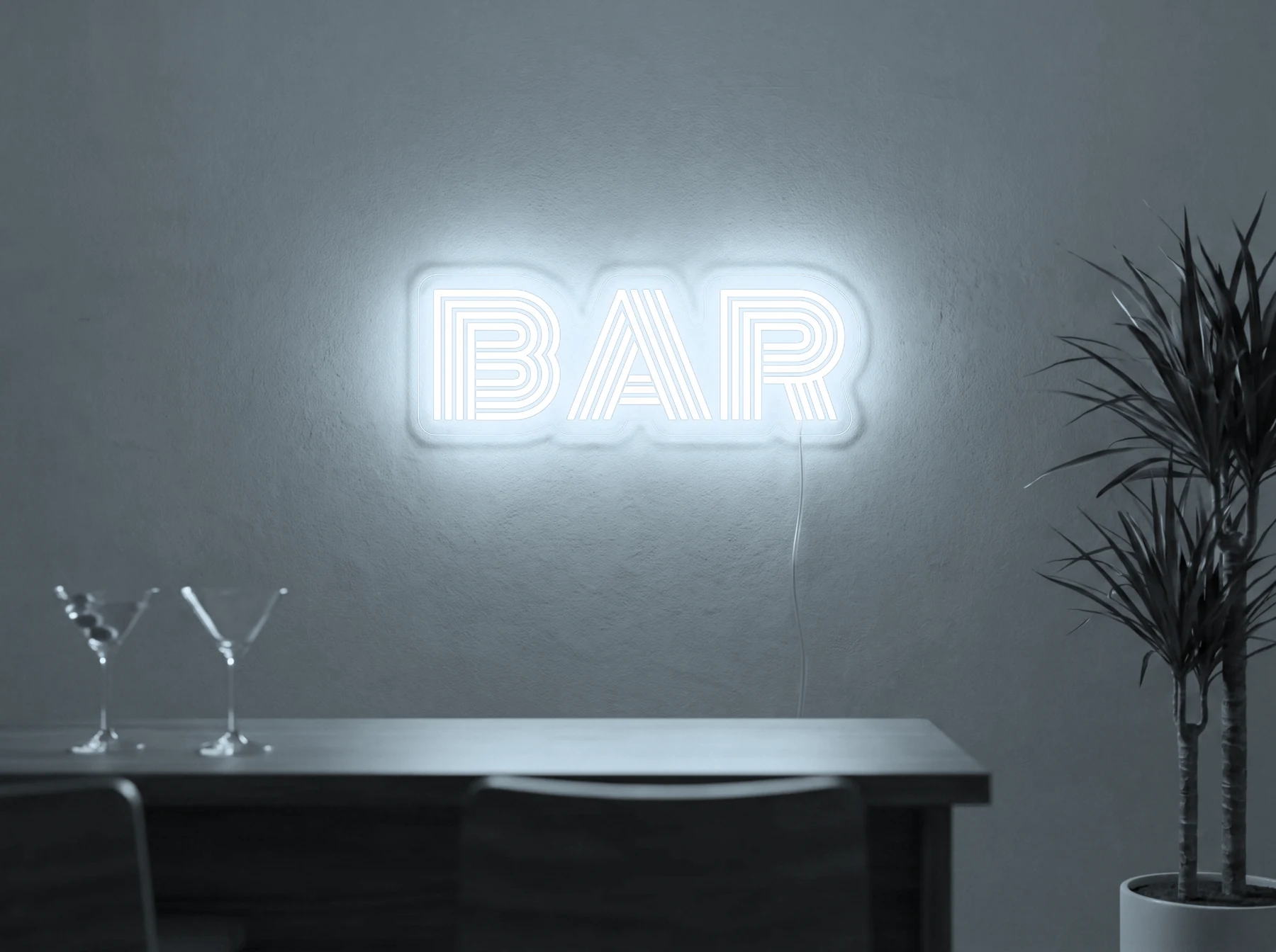 Neonskylt «BAR» i iskall vit LED-neon, monterad på vägg