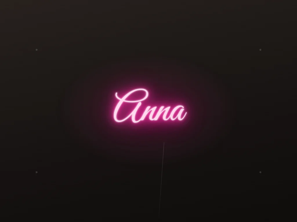 Neonskylt «Anna» — monterad på vägg, med ljusringen bakom