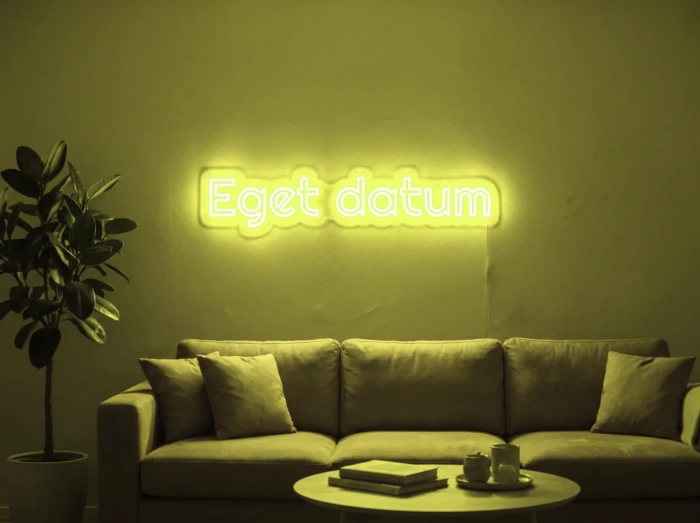 Neonskylt «Eget datum» i gul LED-neon, monterad på vägg