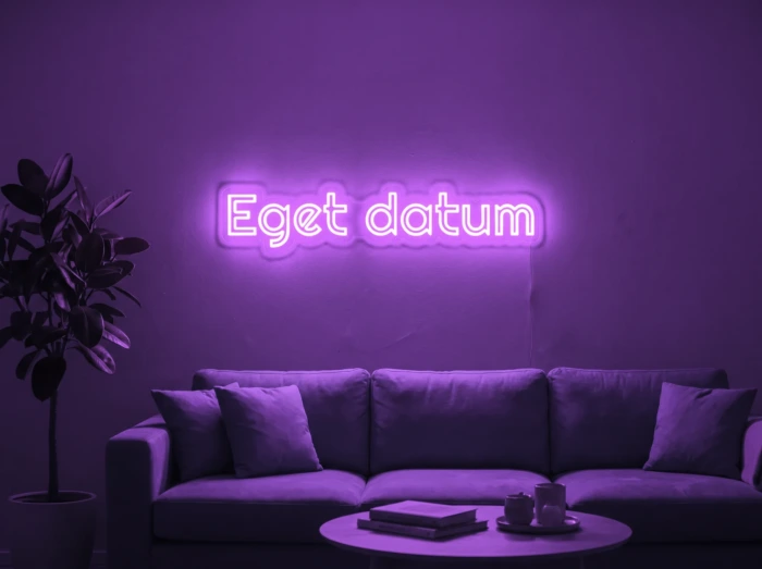 Neonskylt «Eget datum» i lila LED-neon, monterad på vägg
