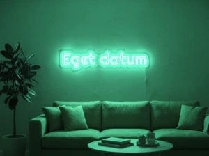 Neonskylt «Eget datum» i mintgrön LED-neon, monterad på vägg