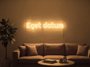 Neonskylt «Eget datum» i orange LED-neon, monterad på vägg