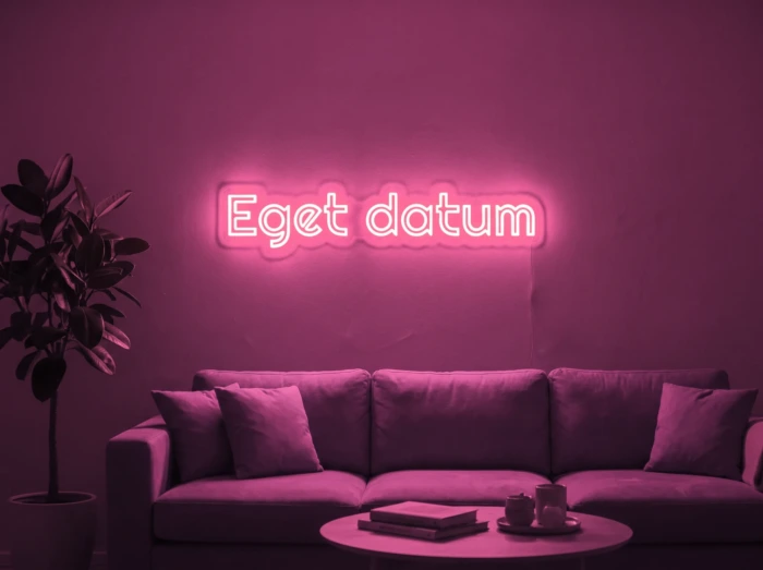 Neonskylt «Eget datum» i rosa LED-neon, monterad på vägg