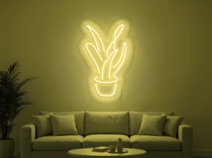 Neonskylt «Aloe vera» i gul LED-neon, monterad på vägg