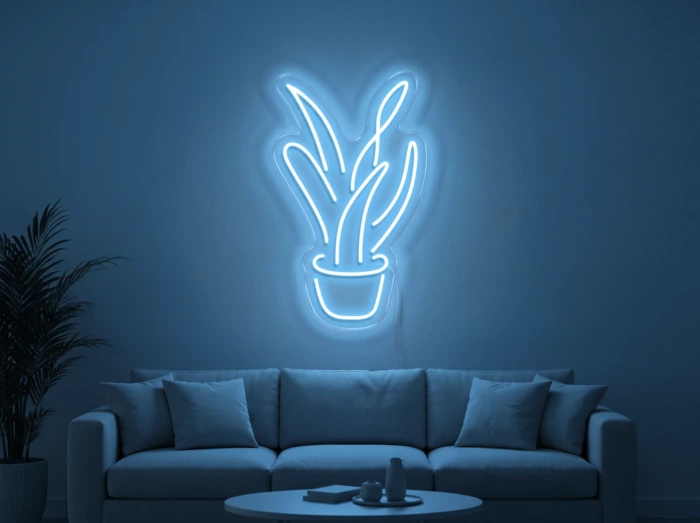 Neonskylt «Aloe vera» i isblå LED-neon, monterad på vägg
