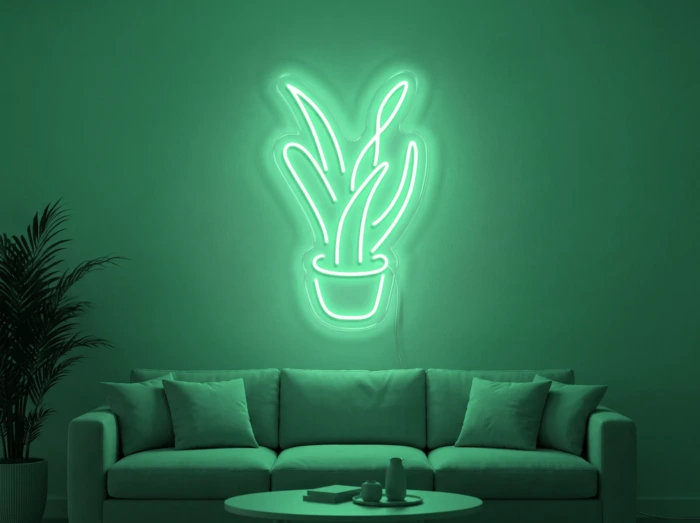 Neonskylt «Aloe vera» i mintgrön LED-neon, monterad på vägg