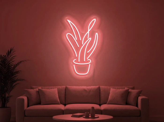 Neonskylt «Aloe vera» i röd LED-neon, monterad på vägg