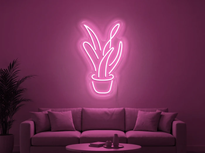 Neonskylt «Aloe vera» i rosa LED-neon, monterad på vägg