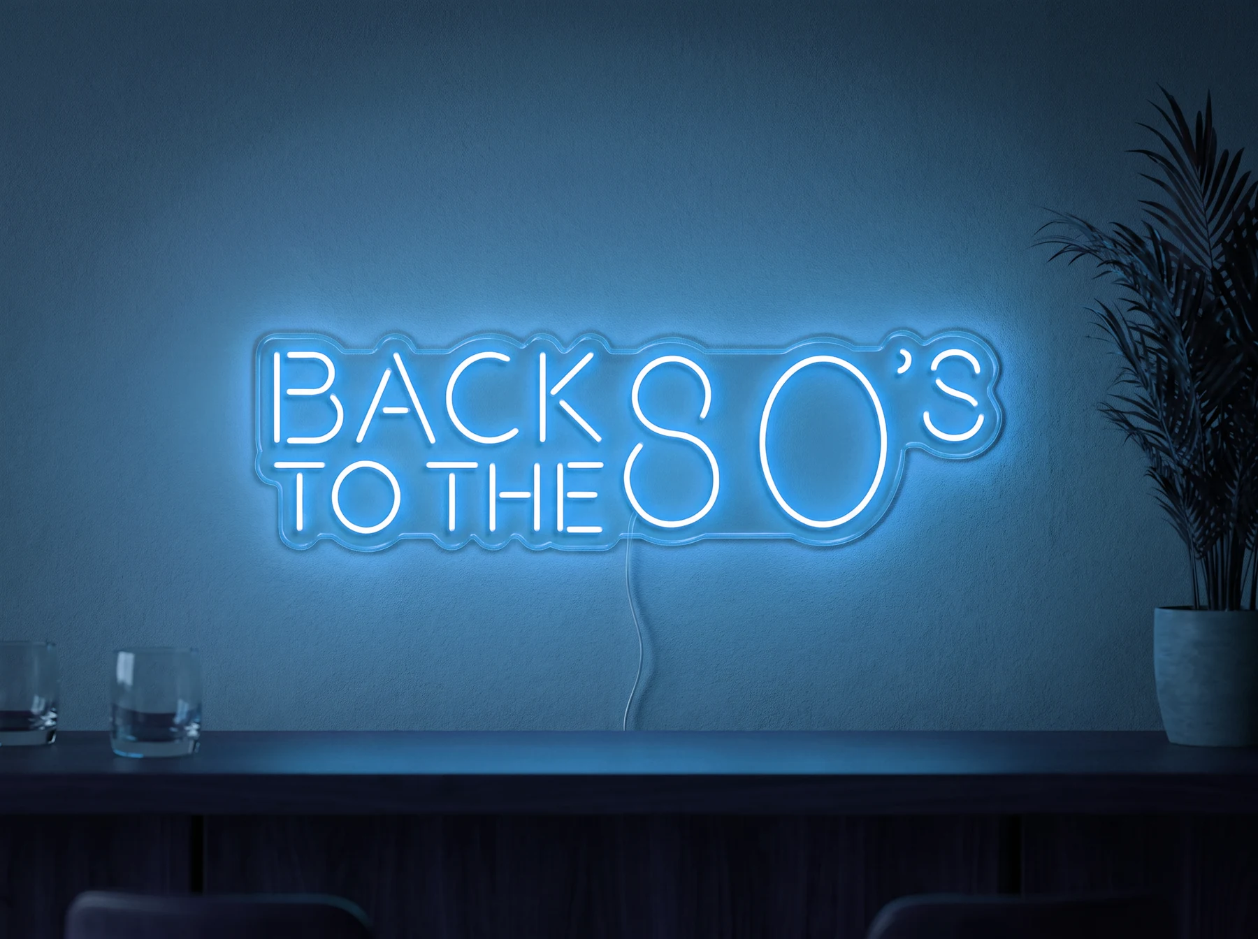 Neonskylt «Back to the 80s» i isblå LED-neon, monterad på vägg
