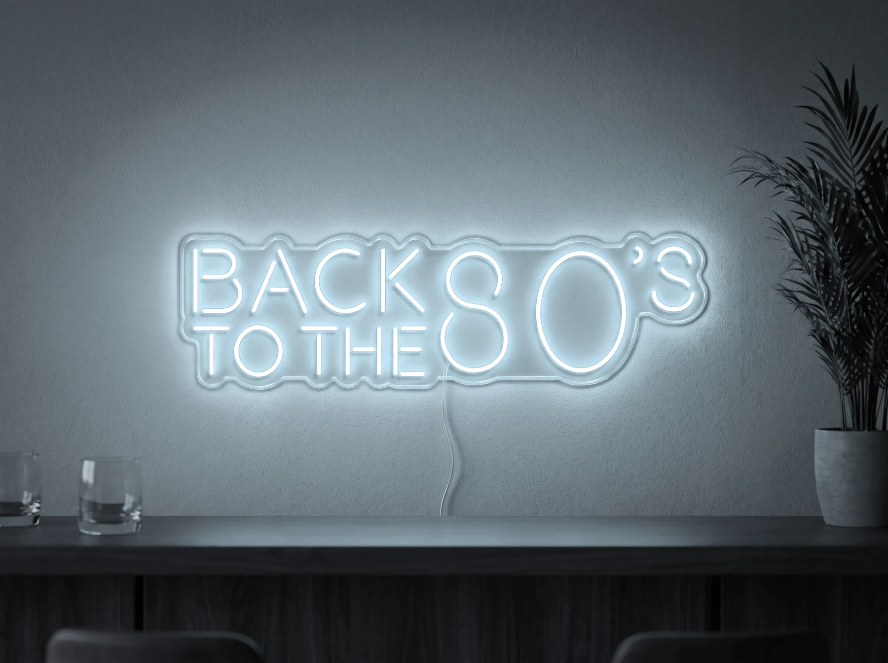Neonskylt «Back to the 80s» i iskall vit LED-neon, monterad på vägg