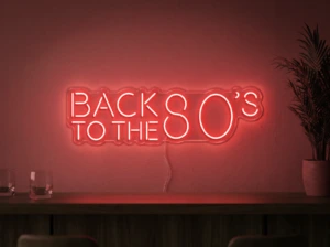 Neonskylt «Back to the 80s» i röd LED-neon, monterad på vägg