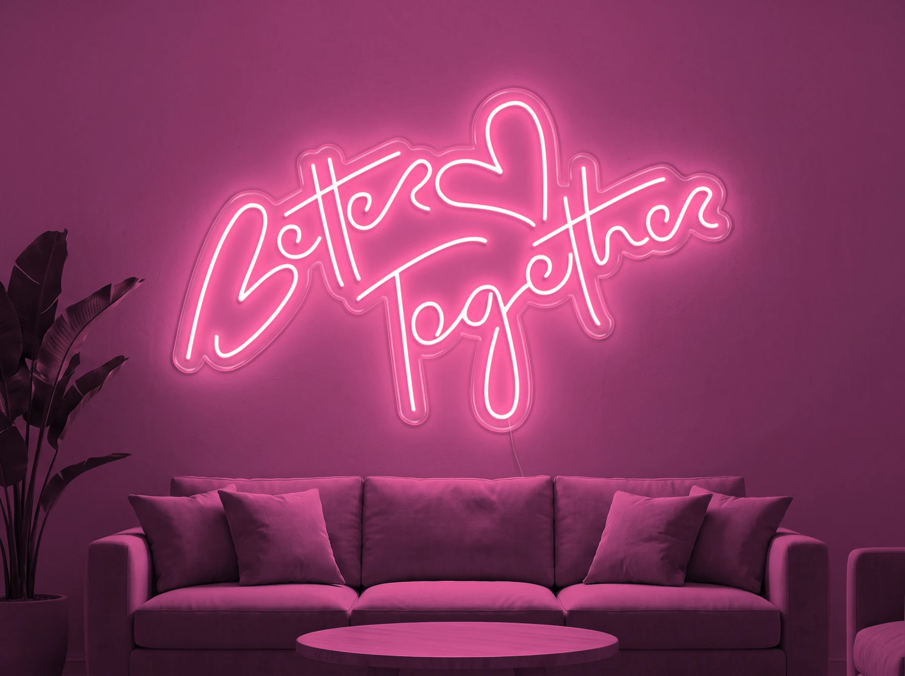 Neonskylt «Better Together» i rosa LED-neon, monterad på vägg
