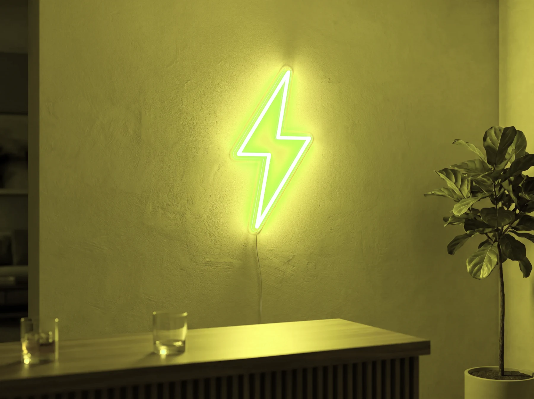 Neonskylt «Blixt» i gul LED-neon, monterad på vägg