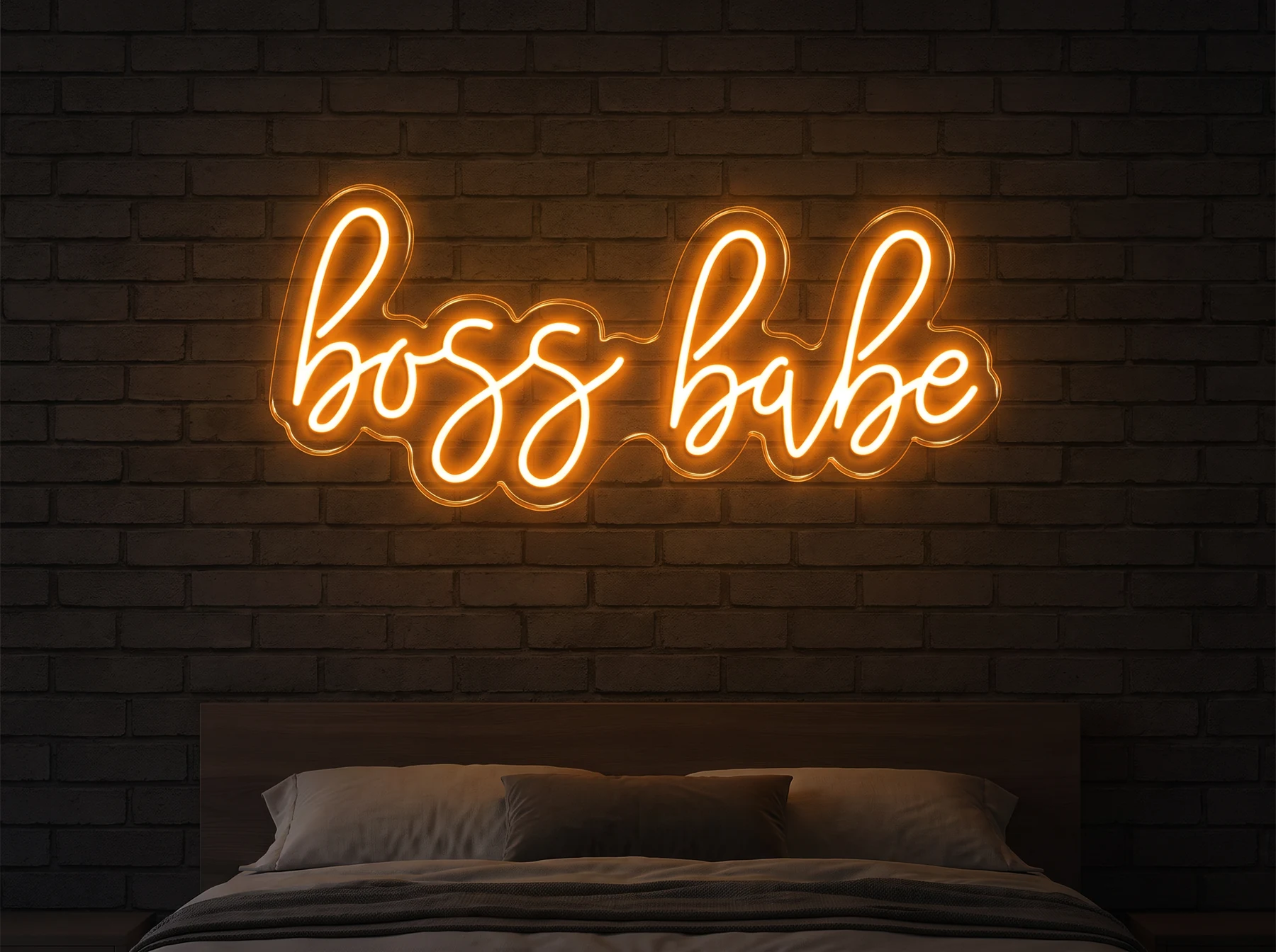 Neonskylt «Boss Babe» — texten Boss Babe, i LED-neon på vägg