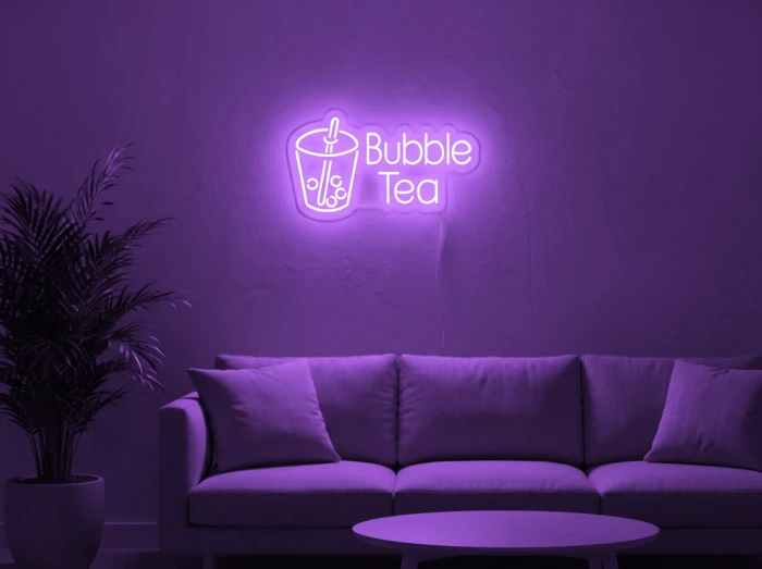 Neonskylt «Bubble Tea» i lila LED-neon, monterad på vägg