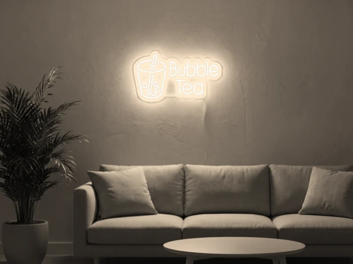 Neonskylt «Bubble Tea» i varmvit LED-neon, monterad på vägg