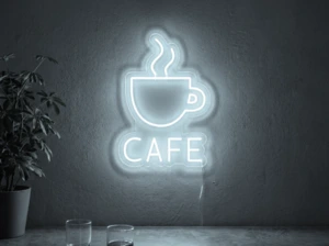 Neonskylt «Cafe» i iskall vit LED-neon, monterad på vägg