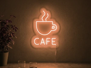 Neonskylt «Cafe» i orange LED-neon, monterad på vägg