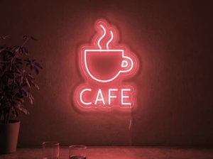 Neonskylt «Cafe» i röd LED-neon, monterad på vägg