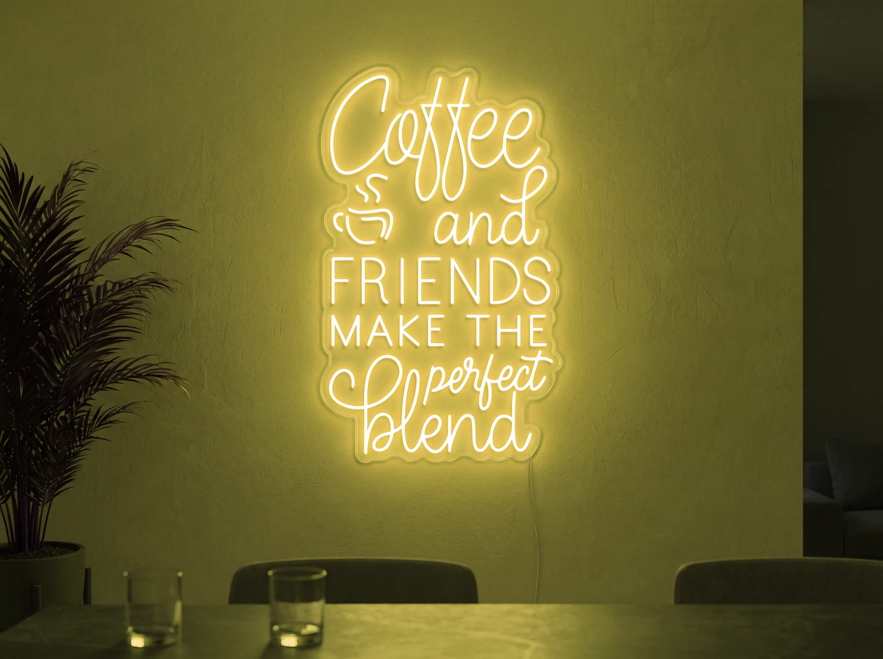 Neonskylt «Coffee and Friends» i gul LED-neon, monterad på vägg
