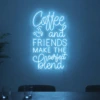 Neonskylt «Coffee and Friends» i isblå LED-neon, monterad på vägg