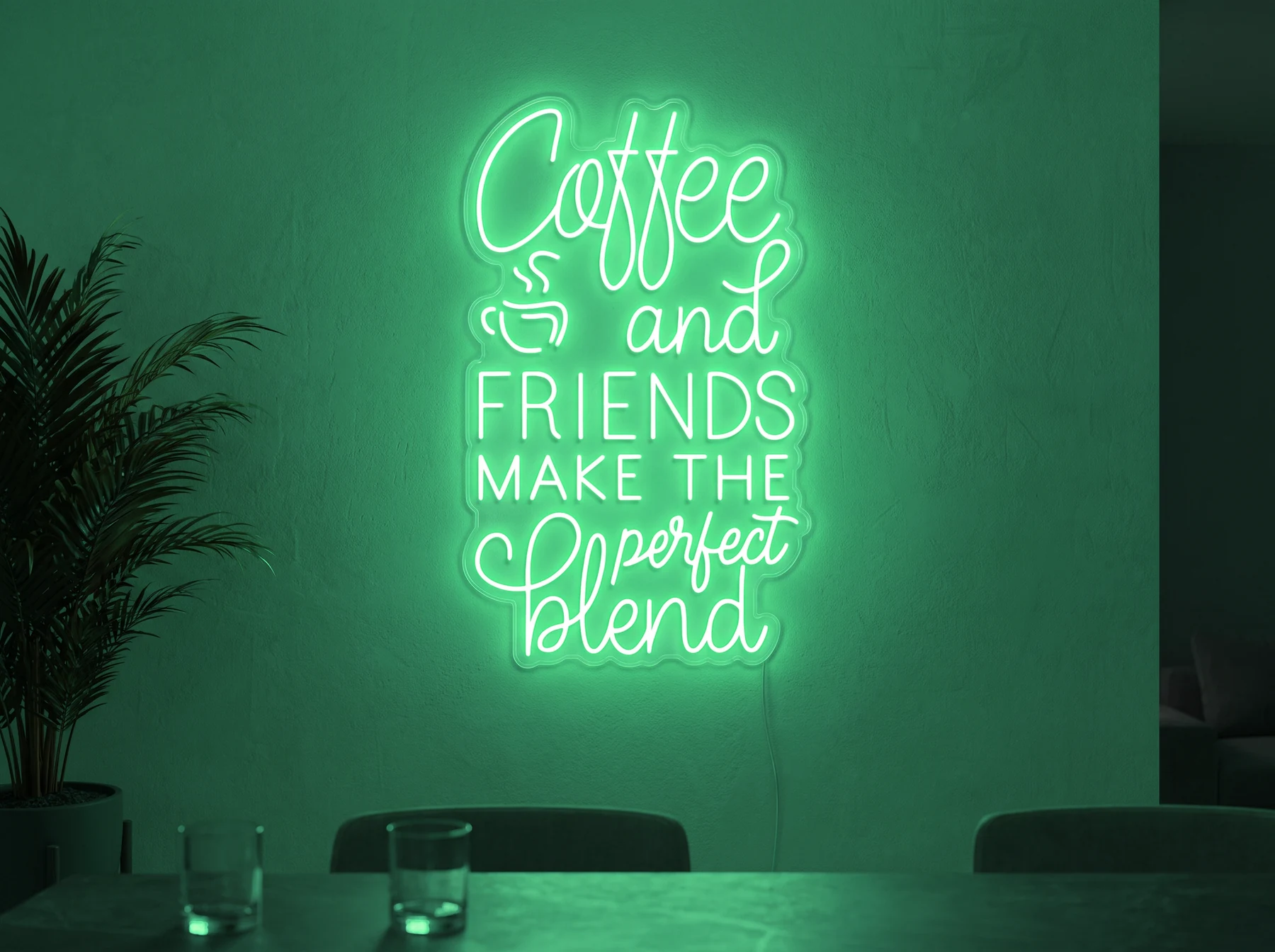 Neonskylt «Coffee and Friends» i mintgrön LED-neon, monterad på vägg