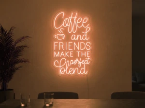 Neonskylt «Coffee and Friends» i orange LED-neon, monterad på vägg