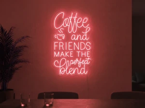 Neonskylt «Coffee and Friends» i röd LED-neon, monterad på vägg