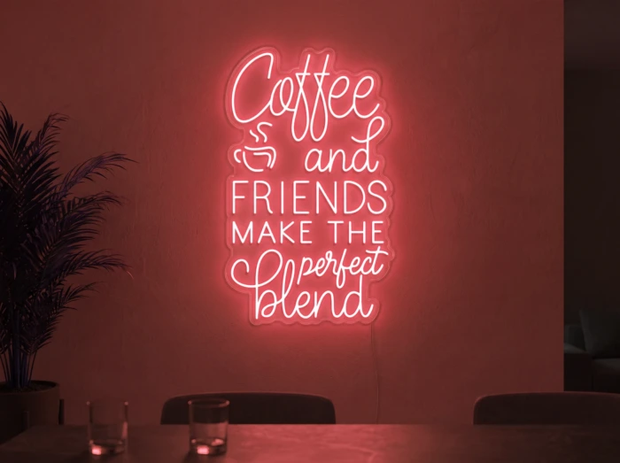 Neonskylt «Coffee and Friends» i röd LED-neon, monterad på vägg
