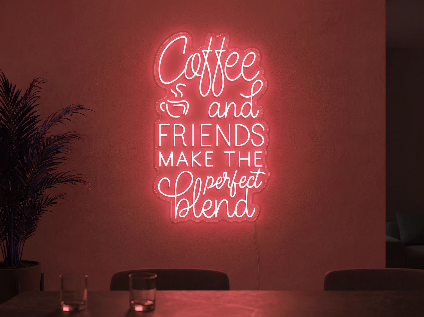 Neonskylt «Coffee and Friends» i röd LED-neon, monterad på vägg
