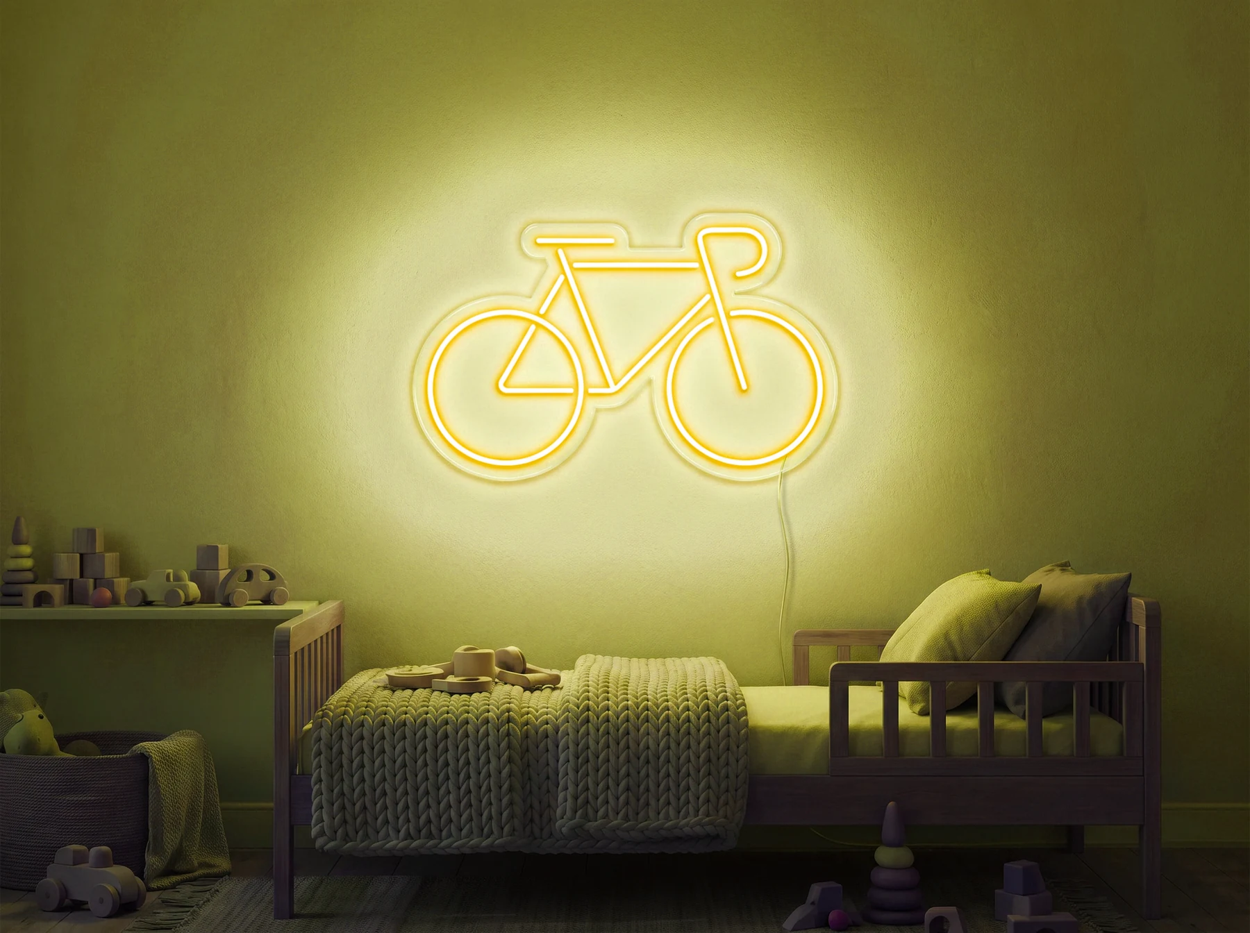 Neonskylt «Cykel» i gul LED-neon, monterad på vägg