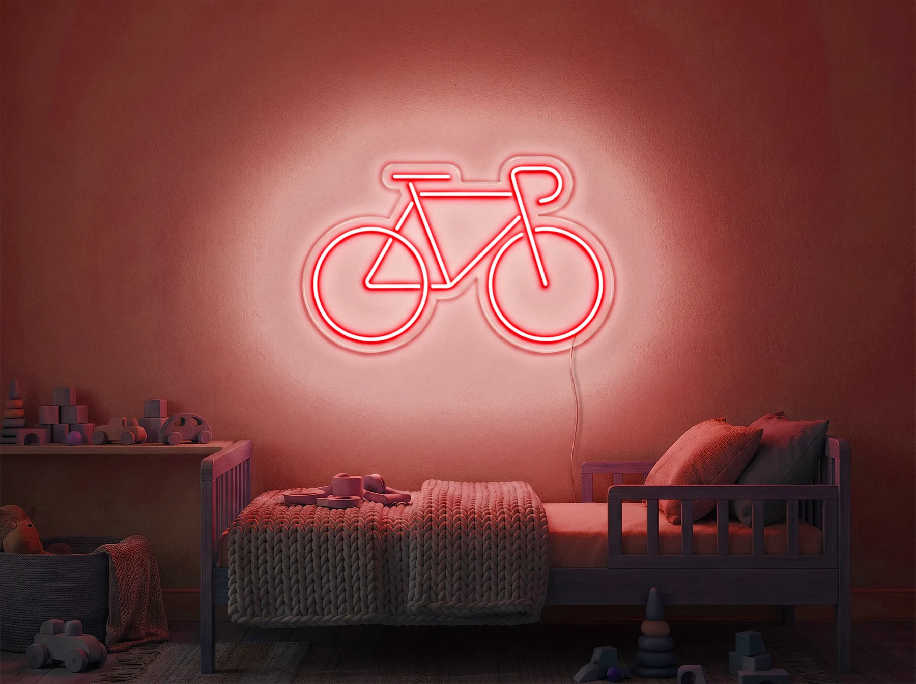 Neonskylt «Cykel» i röd LED-neon, monterad på vägg