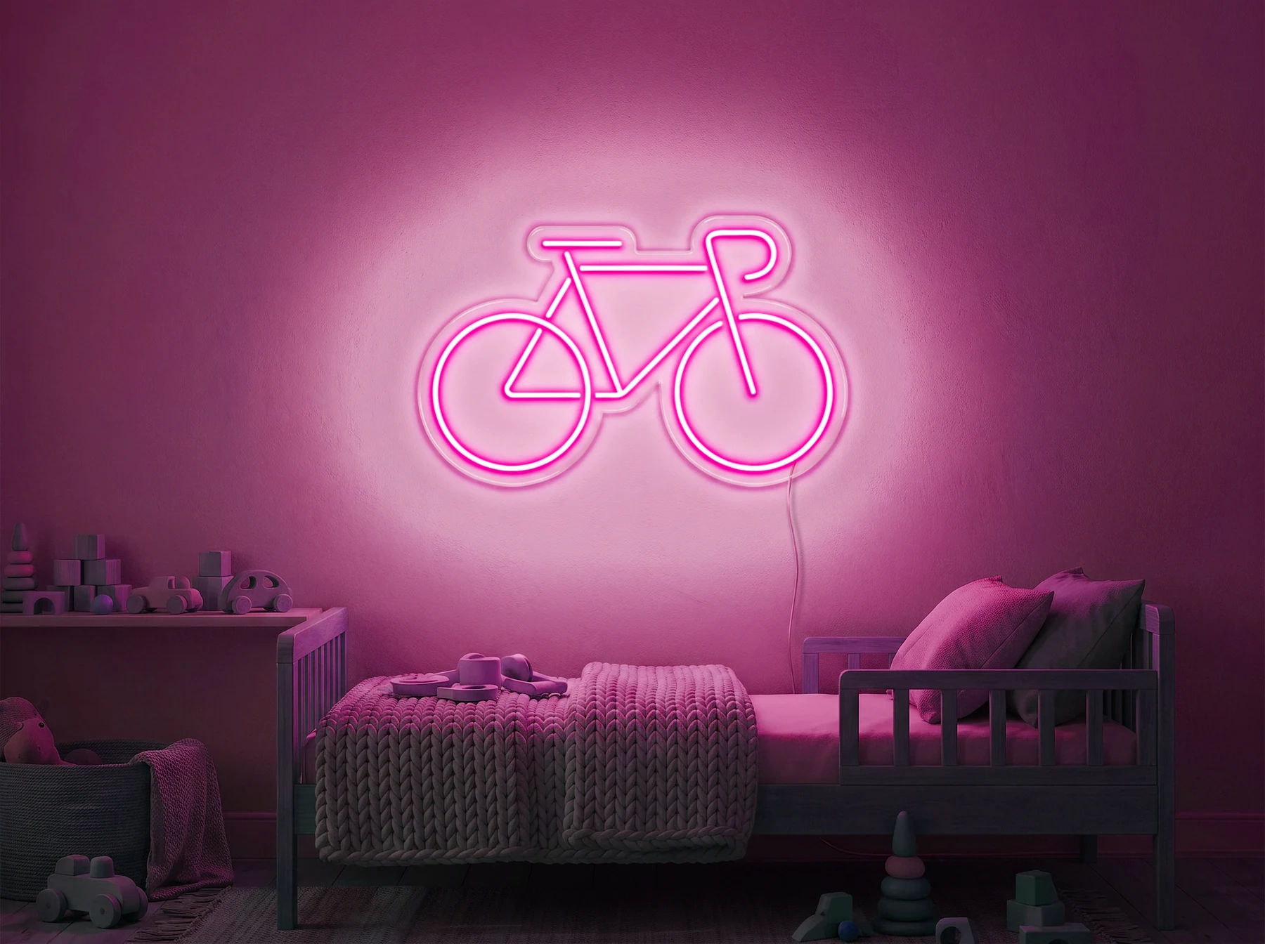 Neonskylt «Cykel» i rosa LED-neon, monterad på vägg