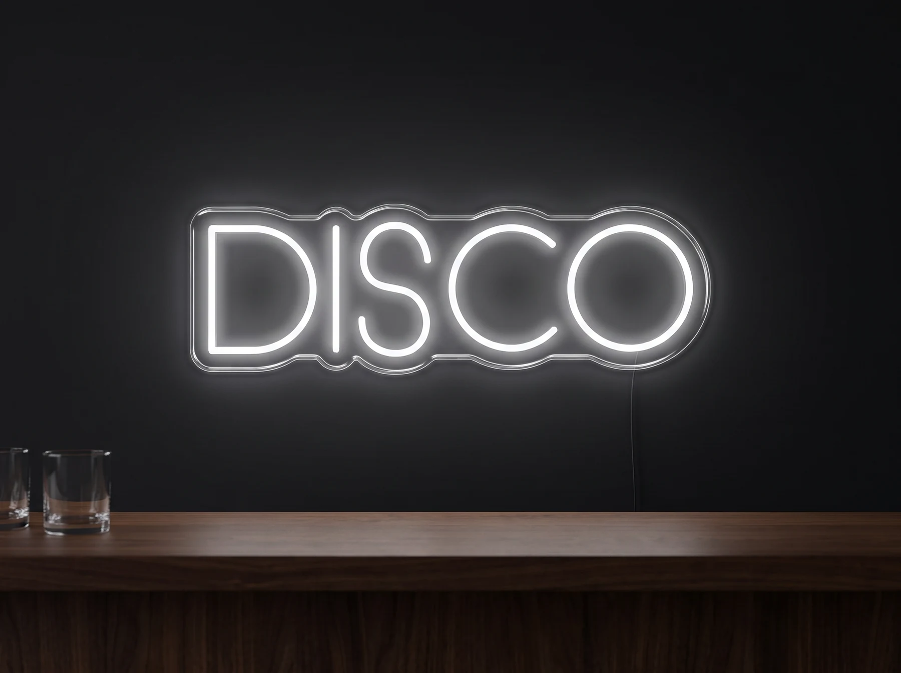 Neonskylt «Disco» — ordet DISCO i versaler, i LED-neon på vägg