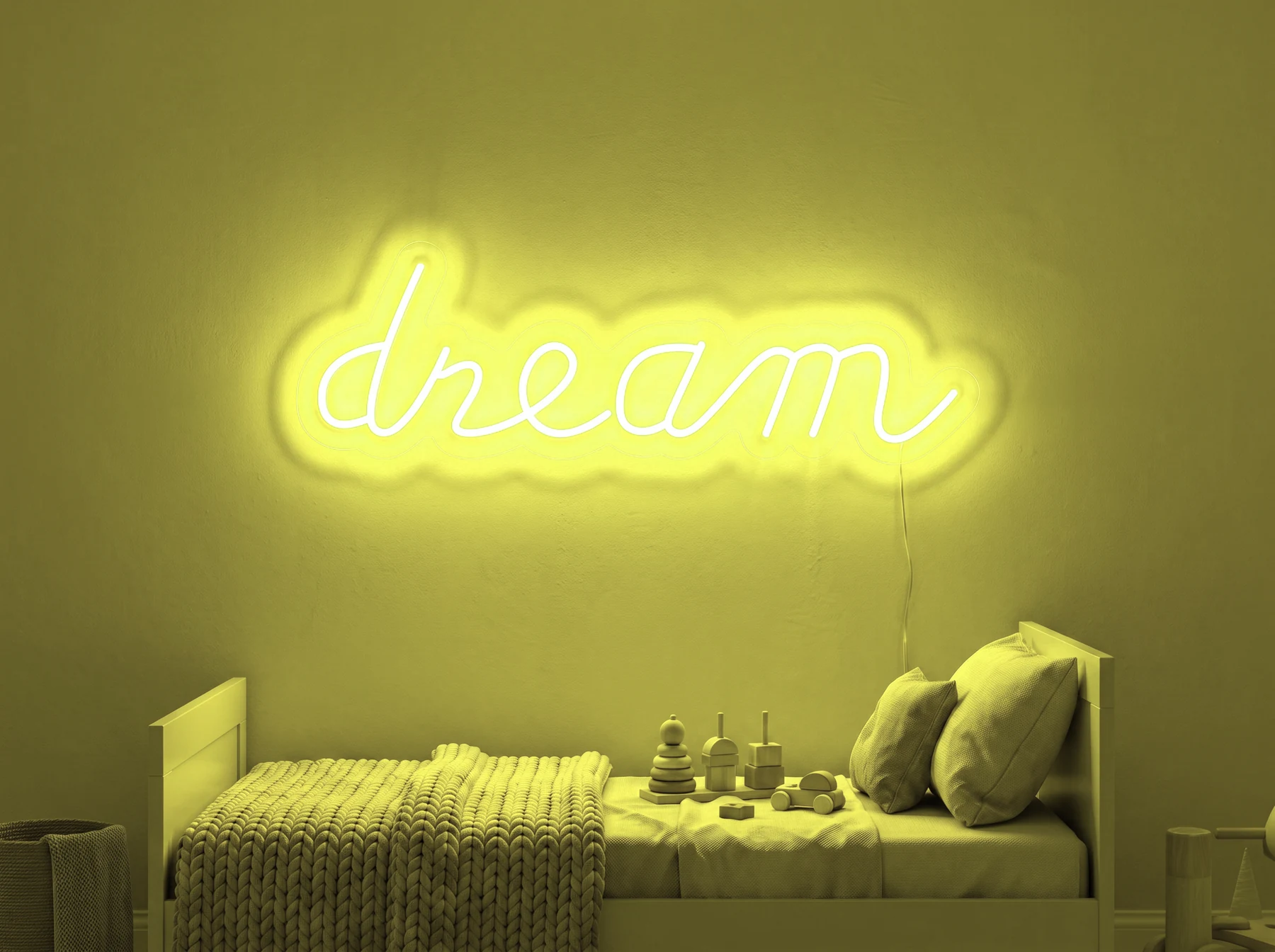 Neonskylt «Dream» i gul LED-neon, monterad på vägg
