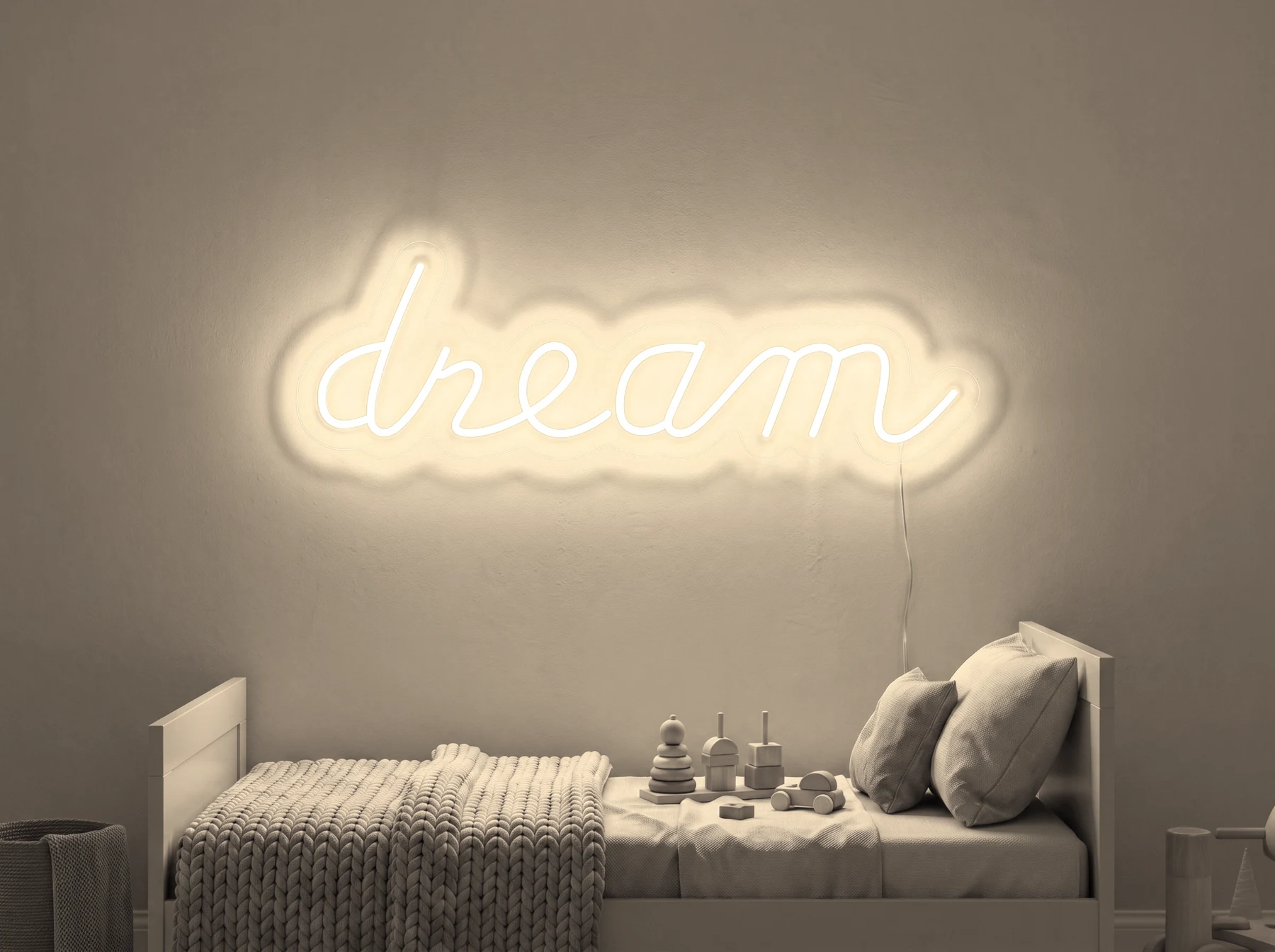 Neonskylt «Dream» i varmvit LED-neon, monterad på vägg
