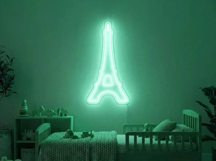 Neonskylt «Eiffeltornet» i mintgrön LED-neon, monterad på vägg