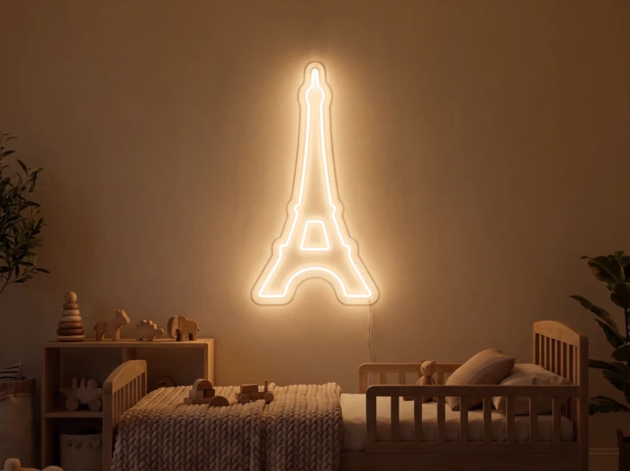 Neonskylt «Eiffeltornet» i orange LED-neon, monterad på vägg