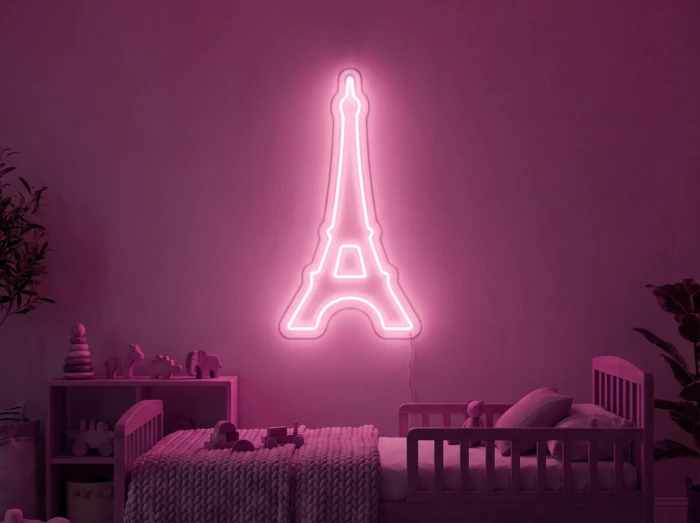 Neonskylt «Eiffeltornet» i rosa LED-neon, monterad på vägg