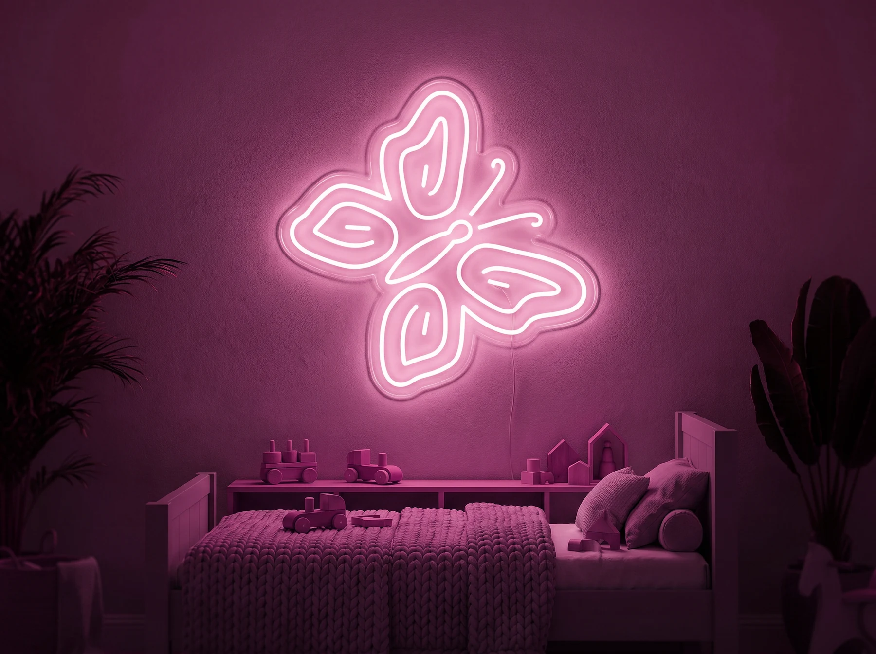 Neonskylt «Fjäril» i rosa LED-neon, monterad på vägg