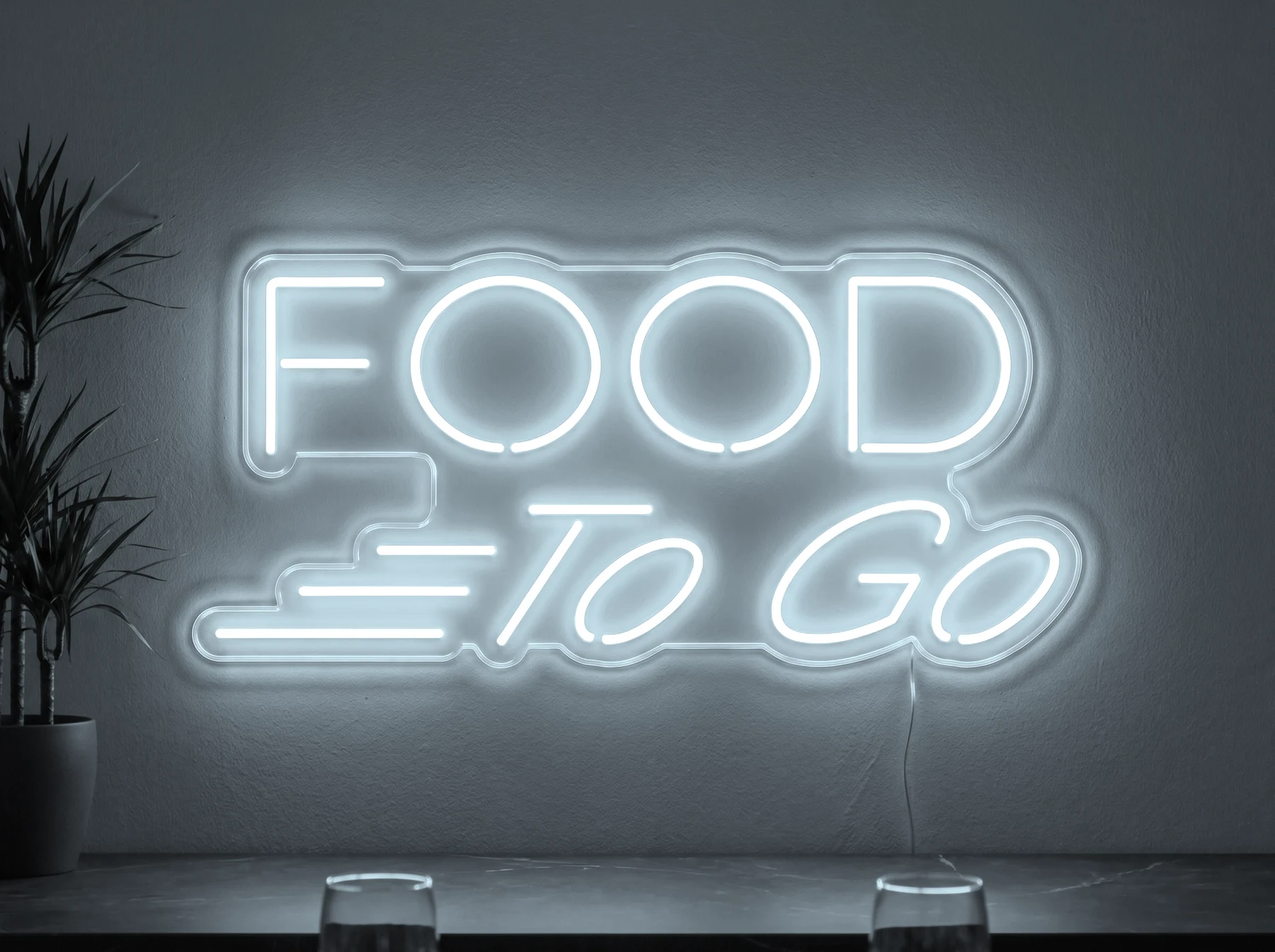 Neonskylt «Food To Go» i iskall vit LED-neon, monterad på vägg
