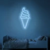 Neonskylt «Softglass» i isblå LED-neon, monterad på vägg
