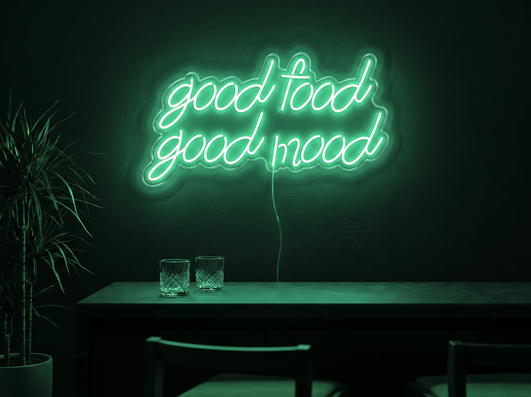 Neonskylt «Good Food Good Mood» i mintgrön LED-neon, monterad på vägg
