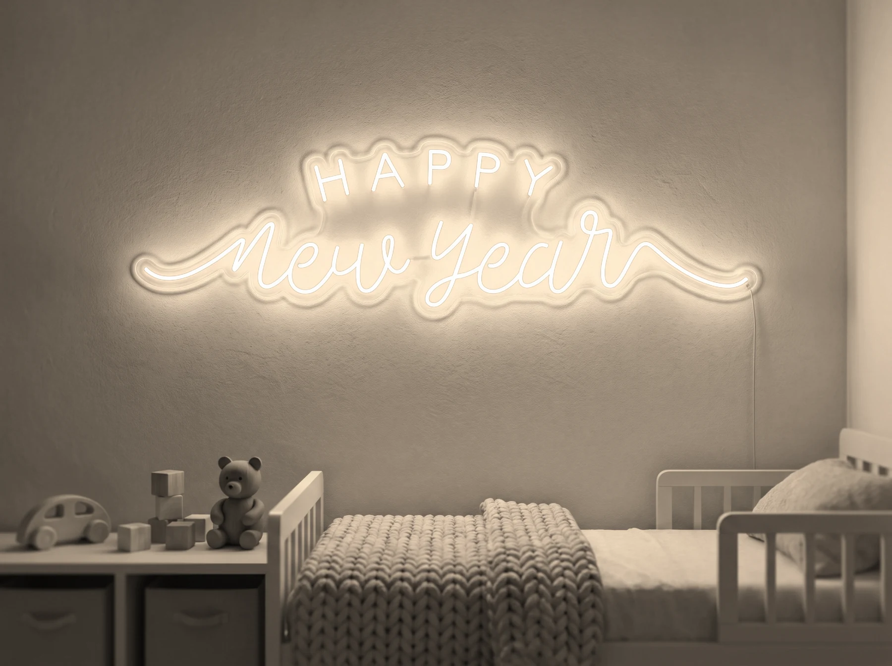 Neonskylt «Happy New Year» i varmvit LED-neon, monterad på vägg
