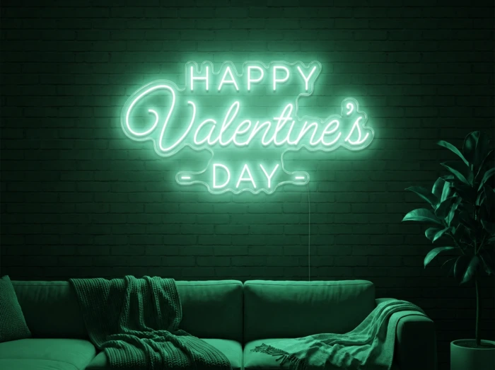 Neonskylt «Happy Valentine’s Day» i mintgrön LED-neon, monterad på vägg