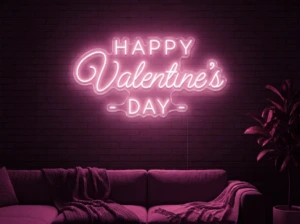 Neonskylt «Happy Valentine’s Day» i rosa LED-neon, monterad på vägg