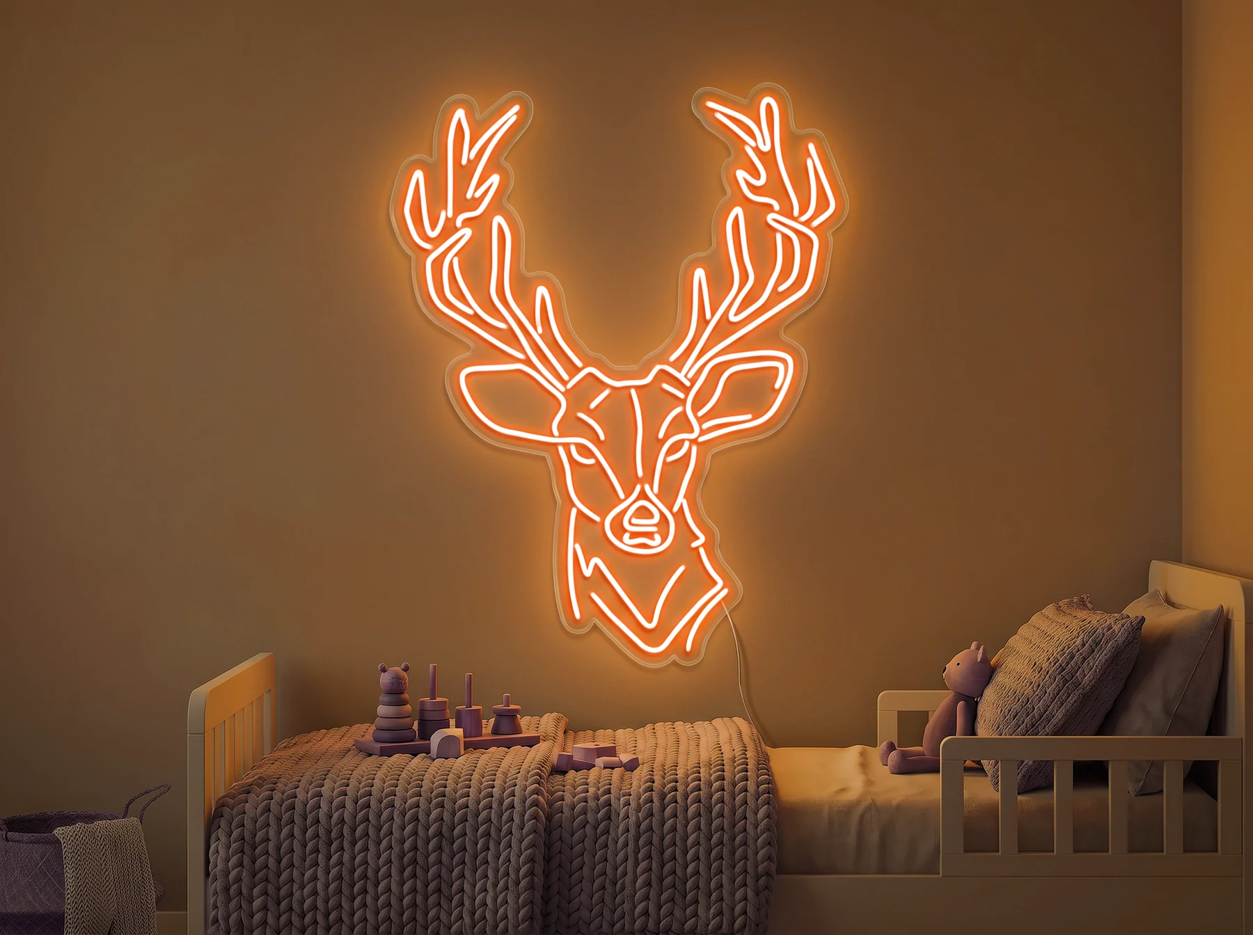 Neonskylt «Hjort» i orange LED-neon, monterad på vägg