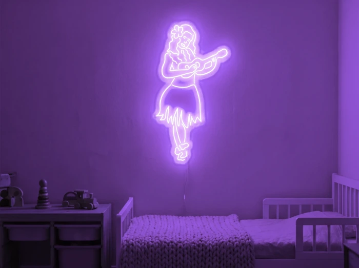 Neonskylt «Huladansös» i lila LED-neon, monterad på vägg