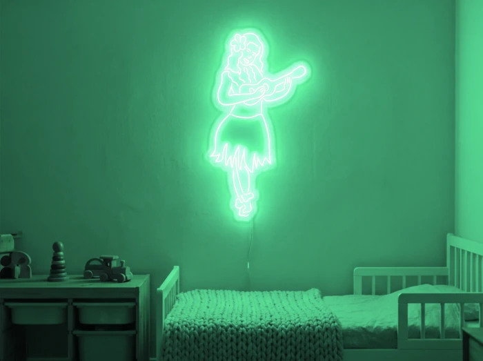 Neonskylt «Huladansös» i mintgrön LED-neon, monterad på vägg