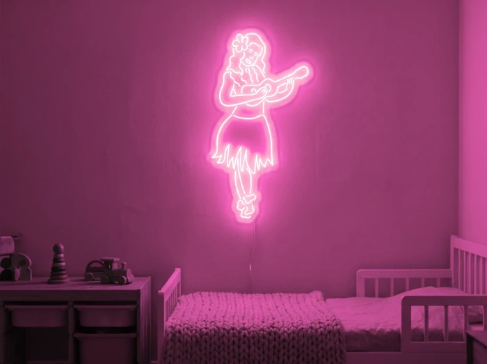 Neonskylt «Huladansös» i rosa LED-neon, monterad på vägg
